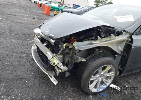 2023 Tesla Model Y Awd/Long Range Dual Motor All-Wheel Drive z USA, uszkodzony, nr VIN 7SAYGAEE6PF600769